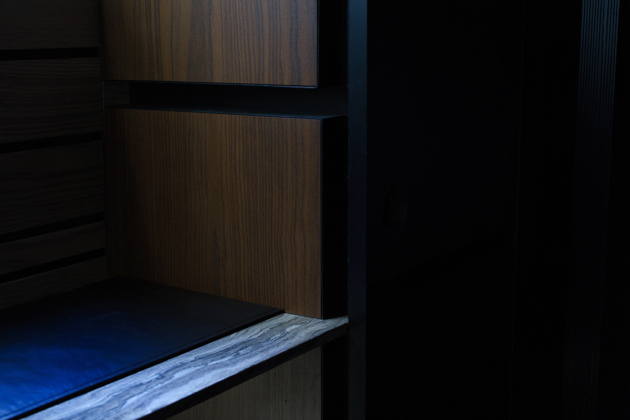 Premium millwork, stone, and steel construction detail